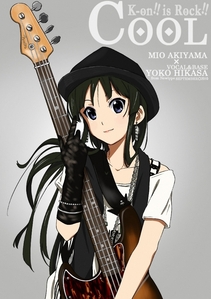  Mio and her amazing bass, besi <3 (I was trying to change the pic not post >.> Dumb Fanpop) Kinda funny how the person spelled bass, besi wrong but it's in such tiny print wewe can't really tell anyways.