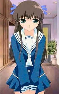 Tohru Honda from Fruits Basket :D you both have brown hair and blue eyes. all u need to do its put ribbons in your hair and get her school girl uniform