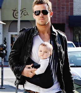  with leather jaket and baby