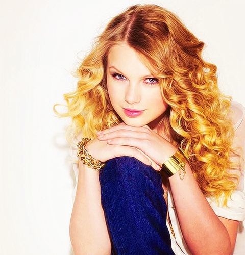 Mine --- Hope U like all my pics <13
Plz check out the links even !!!

http://1.bp.blogspot.com/-BiWmHPSH9nw/T2vJTuJhrrI/AAAAAAAAE1w/dgxn_kuKv1Q/s1600/Taylor-Swift-Curly-Hairstyle.jpeg

http://www.mynewhair.info/wp-content/uploads/2011/01/taylor-swift-side-ponytail.jpg

http://www.sugarslam.com/wp-content/uploads/2009/07/taylor-swift-lei-1.jpg