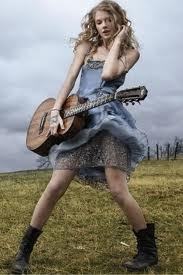 Tay swift with guitar and boots!hope you like this..