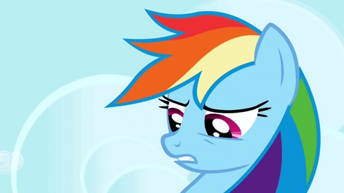 It looks like a clear huge mouse with elvis hair and a bowtie... I can't tell but no offense... What the fuck? I am not so sure Rainbowdash knows either.