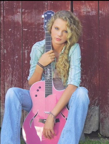 mine tay with pink guitar!!!
http://www.cmt.com/sitewide/assets/img/events/2008/country_thunder/day_one/taylor_swift_04-x600.jpg