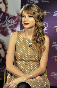 here is mine

and check the links too

http://roccosrevolution.files.wordpress.com/2011/05/taylor-swift-xm-04.jpg

http://www.fansshare.com/gallery/photos/10399/Taylor-Swift-Milan-Polka-Dot/