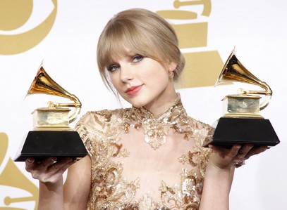  here is my pic,she is holding 2 Grammys