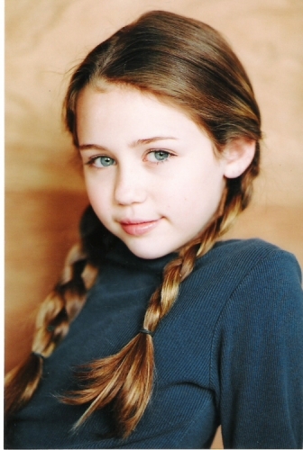  mine http://images.fanpop.com/images/image_uploads/Young-Miley-and-Billy-Ray-smiley-miley-cyrus-118533_529_780.jpg