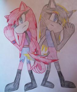  If its not 2 late... Ember stubborn, super calm unless some1 messes with her Friends Cat Or.... Tempest quiet, never says anything 1 anybody except Ember, Tends 2 blast w/ lightning people who tick her off... loup (Ember Left....Tempest Right)