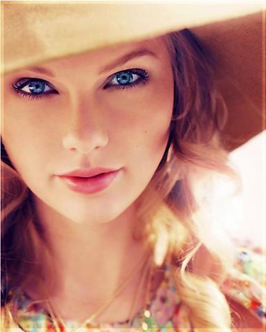  here: tay wearing a hat<3