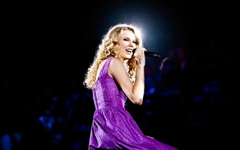  taylor in purple in a photoshoot