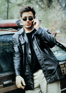 lol younger Rob! :), leaning against a car 