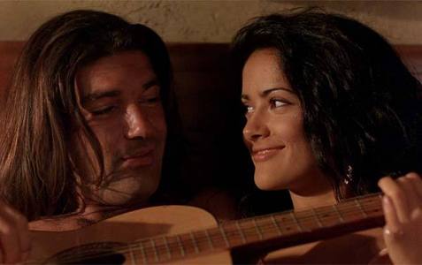 DESPERADO, mostly because El Mariachi it's such an epic character, handy with both guitars and guns. Also, the fact that he handles the ladies smoothly it's a big plus ! I could never get tired of watching this movie <3