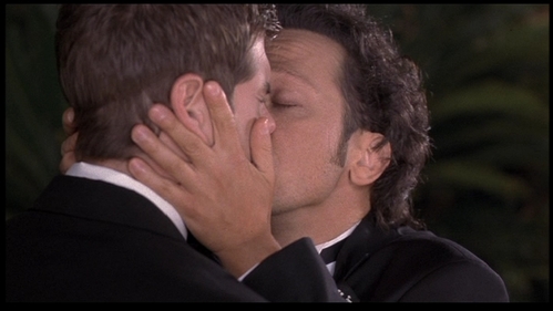 Matthew gets a kiss by Rob Schneider!! YUCK!!