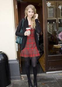  I don't know how to post links, just know how to add pics. Anyways, here's one of her with a Starbucks drink.