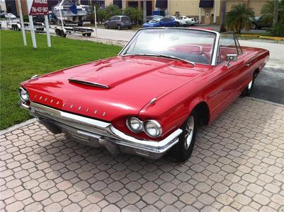  An Aston Marin DB5 (you know, James Bond's car) would be pretty cool. hoặc maybe a DeLorean that travels back in time. But I've always wanted a red 1964 Ford Thunderbird. My dad used to have one at the dealership he worked at and I fell in tình yêu with it. My tình yêu for it hasn't died and one of these days, I'm going to own this car.