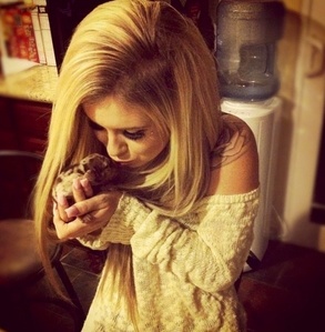  Because its a picture of me holding a adorable little baby chick. ^-^