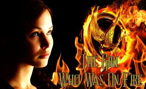 I didn't make this, it's from deviantART. But it is, I think, one of the best solo Katniss wallpapers on there: 

