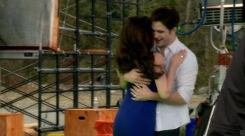  Here is Robert Pattinson hugging his Twilight co-star Kristen Stewart.This pic is from Breaking Dawn part 2.