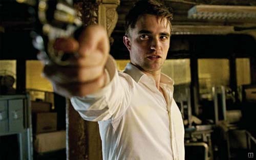  Here is my Robert,in a scene from his movie Cosmopolis,with a gun.