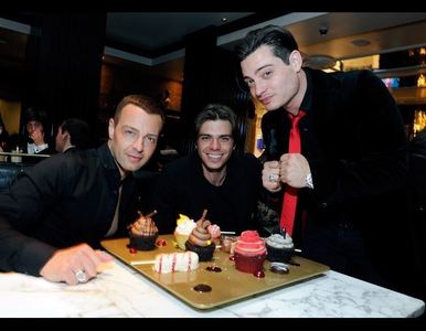  Matthew with his brothers, Joey and Andy with cupcakes in front of them. :)