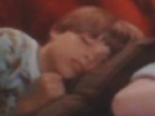  Young Matthew asleep on a couch. (: