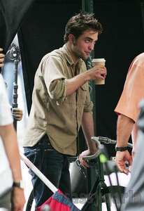  my HOT Robert holding coffee<3