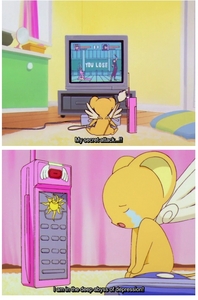 Kero from cardcaptor sakura ! srry couldn't find any other pic of him playin video games.....::((