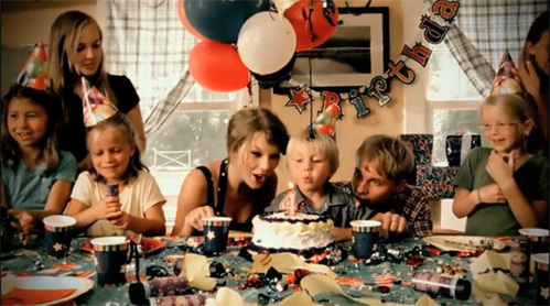 Taylor with balloons.:}