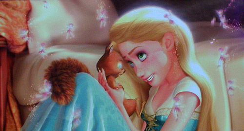 I think you mean TIANA and RAPUNZEL XD

But I guess... out of them... you look a bit like Rapunzel from her previous looks. Here's a picture. The hair, freckles, what more do ya need?