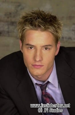 Justin wearing a purple tie for a "Passions" photoshoot