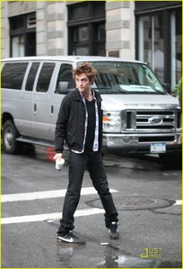  my Robert standing in the middle of the street<3