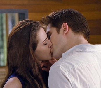  here is my baby,Robert snogging Kristen Stewart,as their characters Edward&Bella in BD 2.I so wish that was me.You wouldn't even have to pay me to Ciuman my Robert,in fact I'd be the one to pay whoever made it happen<3