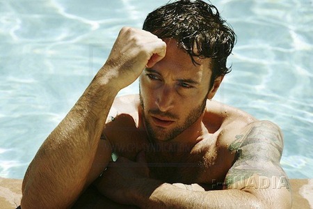  Alex O'Loughlin on a pool