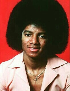  His fro in the 70's. i think he looked so cute.