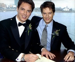  John Barrowman with his partner, Scott Gill, at there wedding :) N'awww!