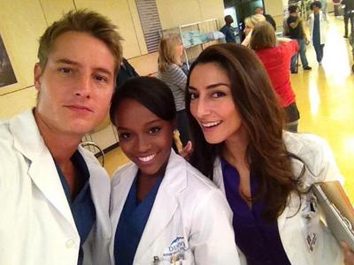  Justin with Aja Naomi King and Necar Zadegan, two of his co-stars on "Emily Owens"