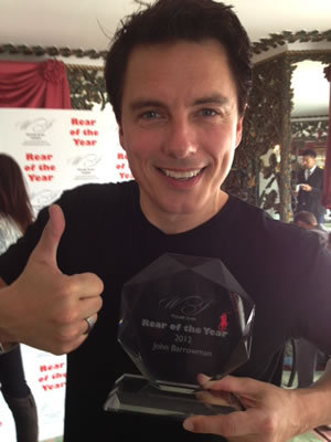 John Barrowman with "Rear Of The Year 2012" award..Wait wait wait, that could be ars*hole of the year :O I never realised till now..Haha