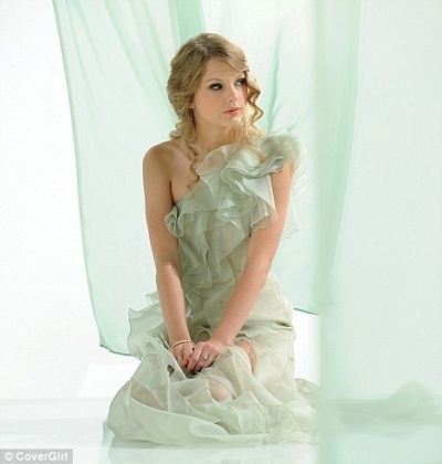 here's my pic.I chose a pale green dress.I love the color and the dress on her.