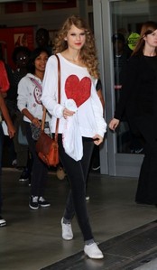 Tay in normal clothes.:}