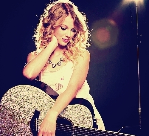 Taylor, and her guitar.:}