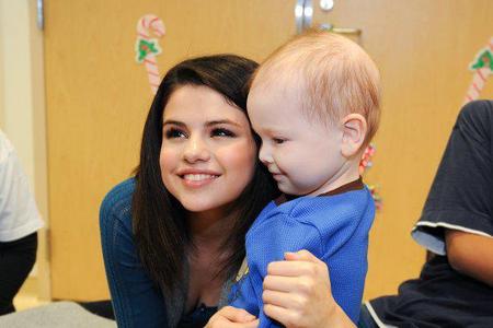 Hope this is oaky ! , Selena with a baby :P