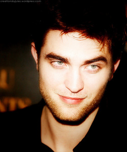  my oh-so-gorgeous Robert with his sexy eyebrows raised<3