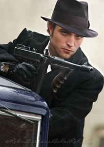  my sexy gorgeous gangster holding a black machine gun.Yes,it's a manip of my baby,but it's sooo incredibly hot<3