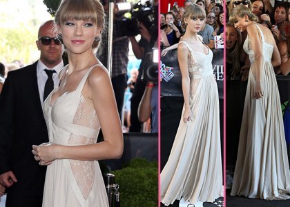  I think this dress looks exactly like a prom dress,and Taylor looks like a prom queen...simply beautiful(the dress and Taylor)
