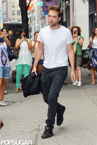 my baby in NY walking with one of his feet just slightly off the ground<3