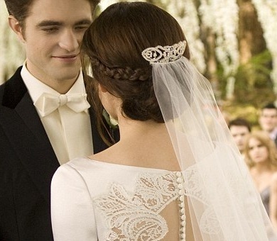  my baby as Edward Cullen in this scene from BD part 1,looking at his new bride,Bella(played by Kristen Stewart) with her back to the camera<3