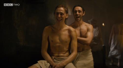  yummy tom hiddleston and i dont know who thas is behind him