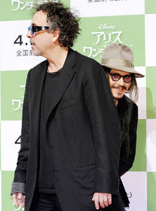 Johnny behind Tim Burton =) It is somone not something....