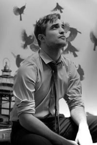  here's my gorgeous Robert in a b&w pic looking up<3