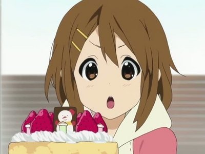  Yui from K-On LOVES food, especially sweets. ^.^