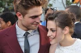  my gorgeous Robert looking at his beautiful sweetheart,Kristen Stewart like she's the only woman in the world.I wish I had a guy like him look at me like that<3